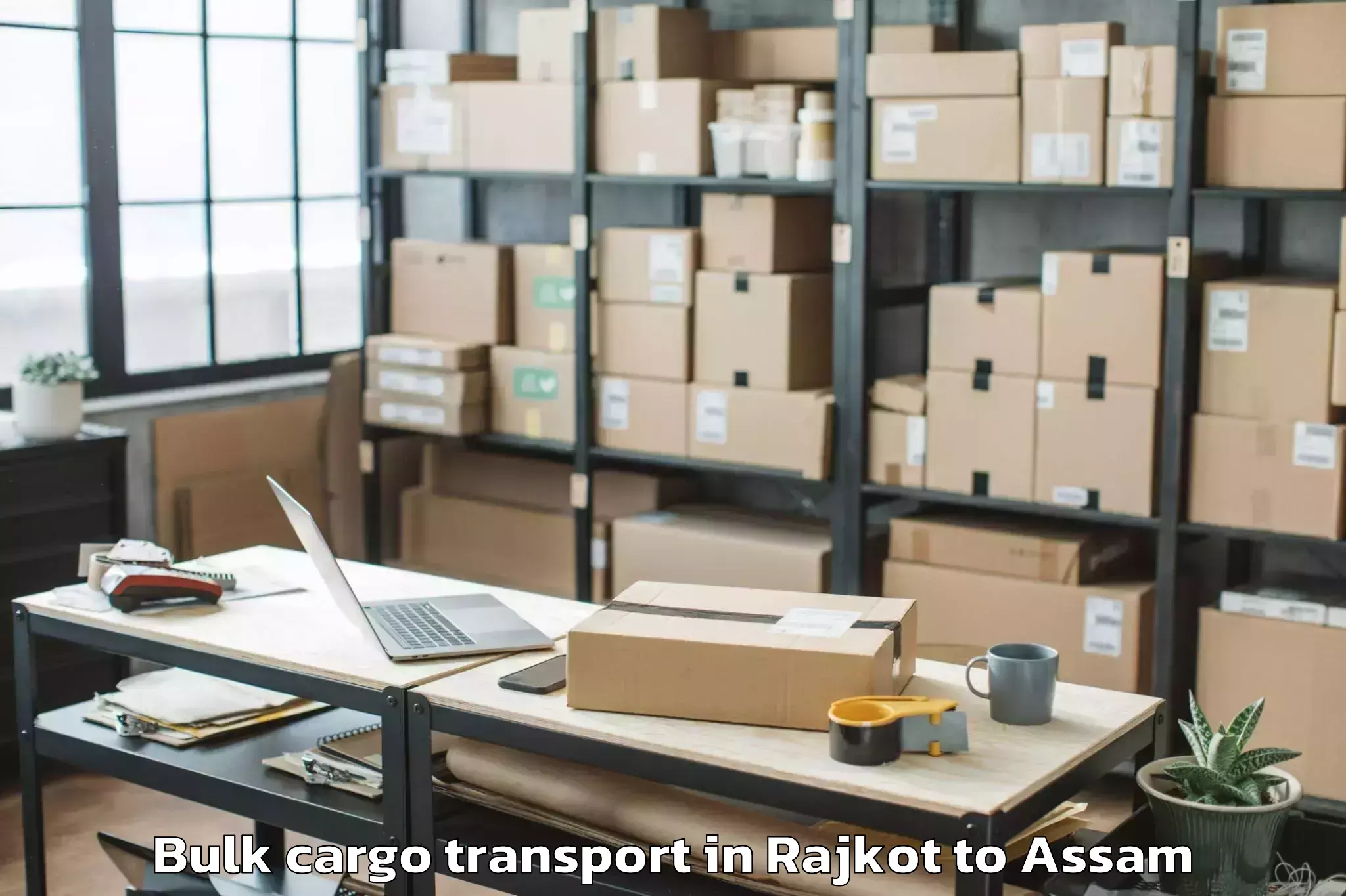 Professional Rajkot to Dhing Bulk Cargo Transport